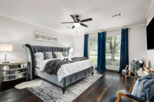 Vacation rentals beat hotels spacious bedroom in Conroe rental property