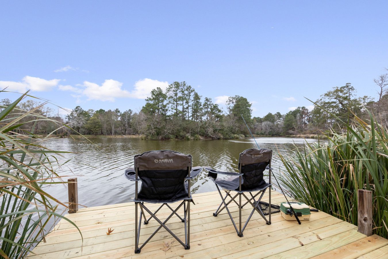 Backyard pool and patio at a Lake Conroe vacation rental