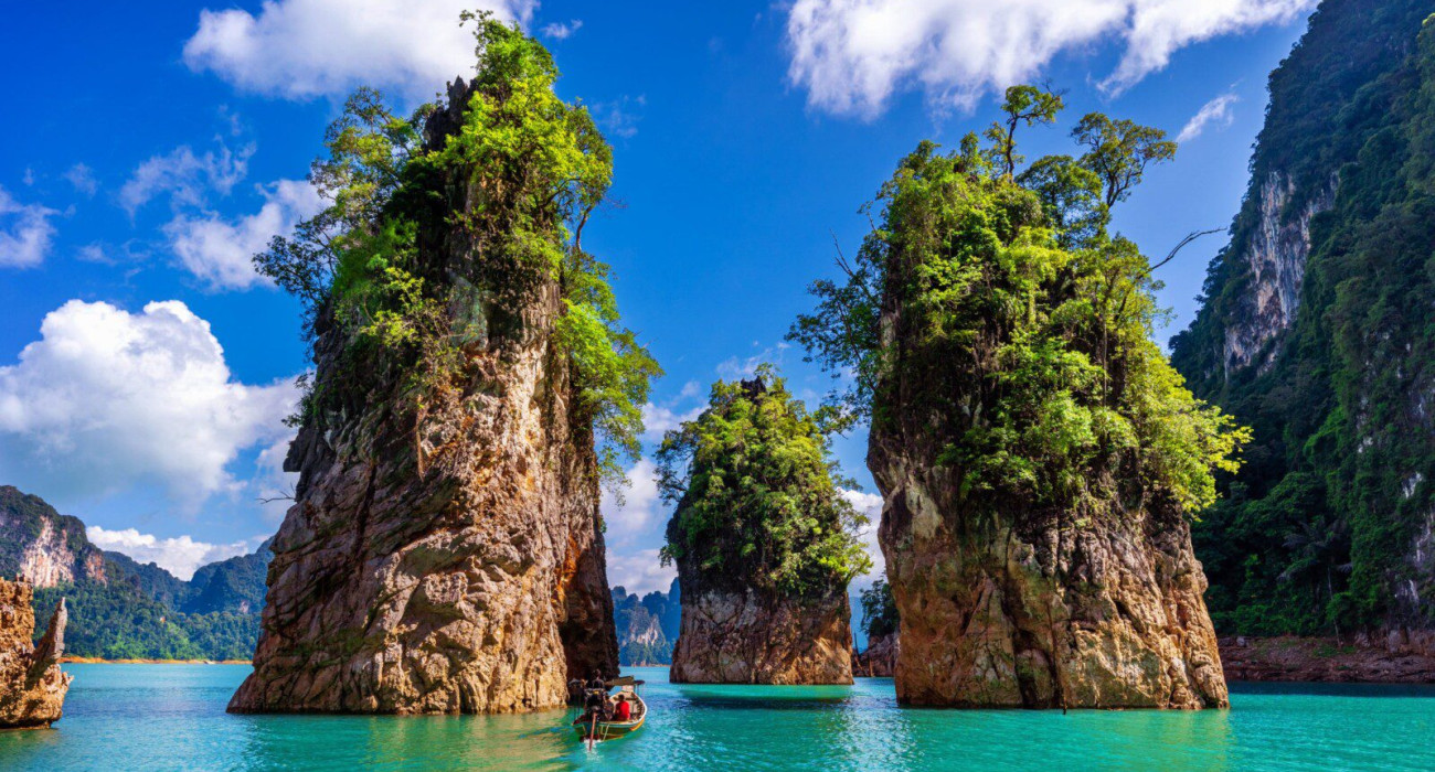 beautiful-mountains-ratchaprapha-dam-khao-sok-national-park-surat-thani-province-thailand-scaled